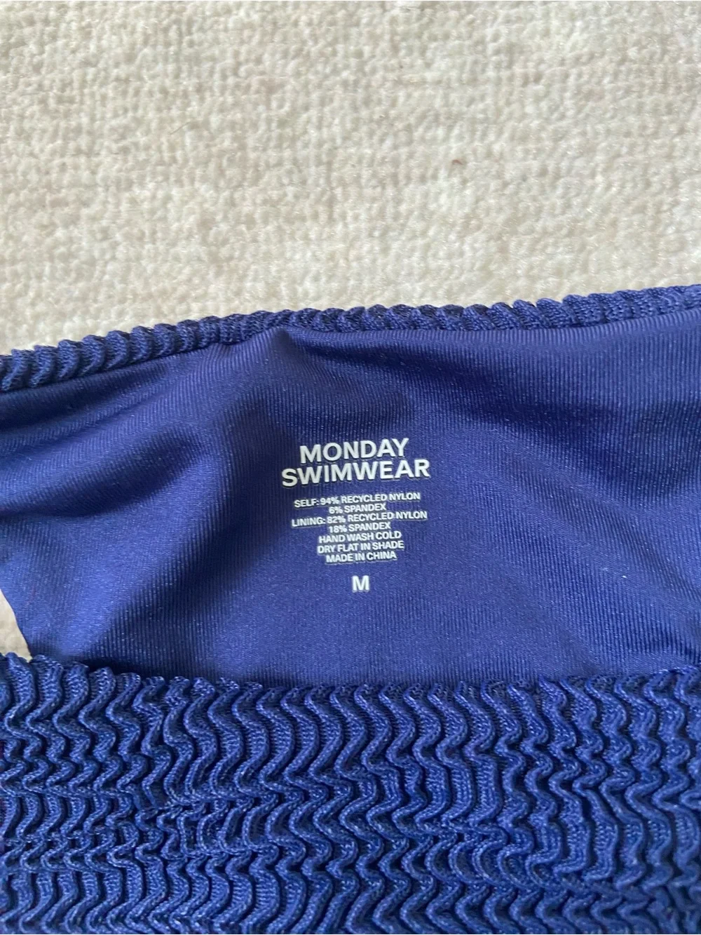 Monday Swimwear accents side lined